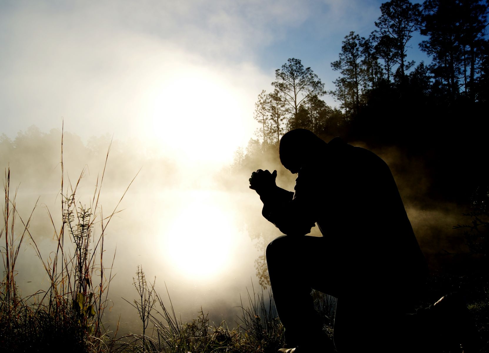 Man sat in prayer